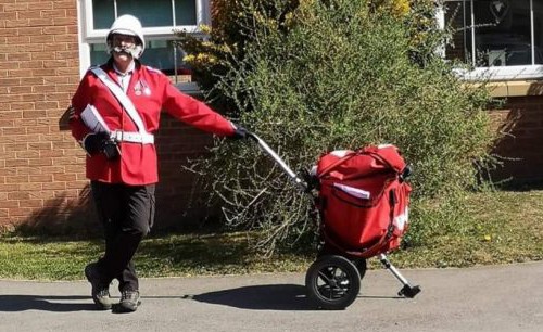 Postie Colin McAlpine’s bagpipes brightens up the village’s day